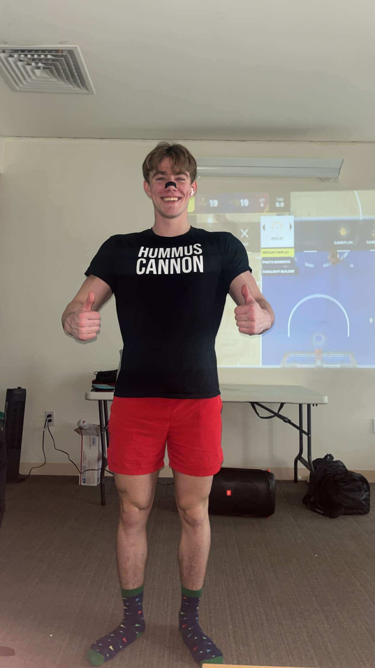 The Hummus Cannon tee worn casually
